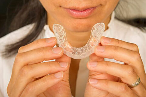 A women has a mouthguard